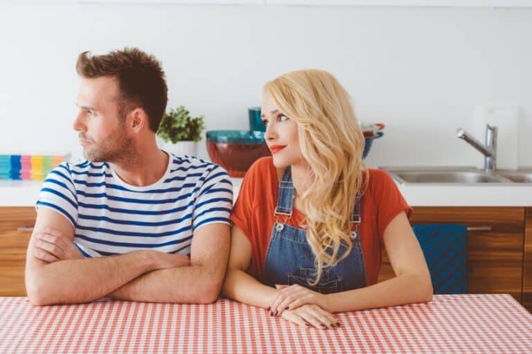 annoyed woman looking at man