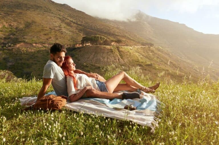couple field summer sun mountain