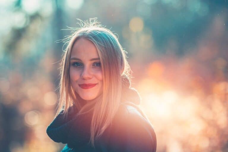 woman sunlight smiling portrait