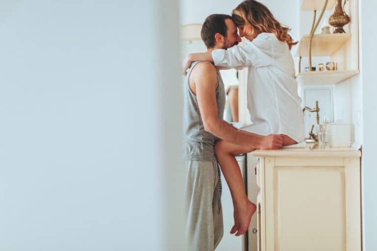 couple kissing kitchen sexy