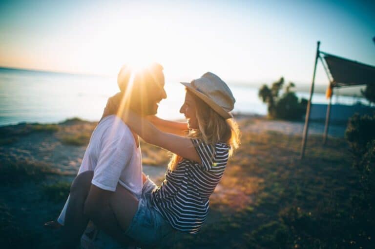 couple sunset beach