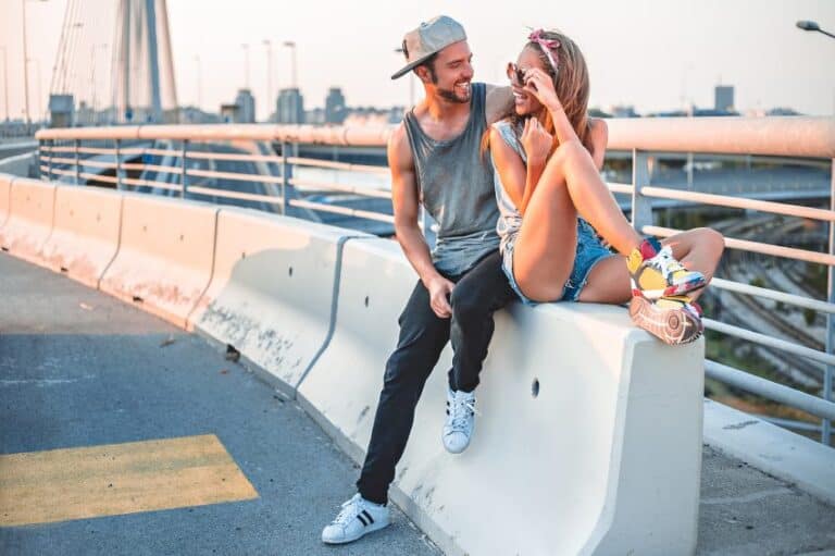 young couple outside sun summer
