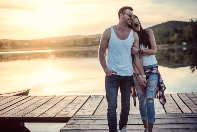couple close romantic walk lake sunset