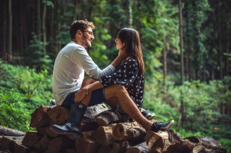 couple forest close cuddle