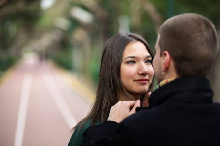 Brunette staring at man