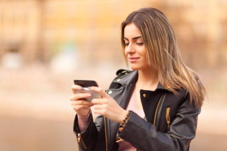 Young woman texting