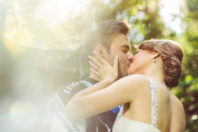 Young newlyweds kissing
