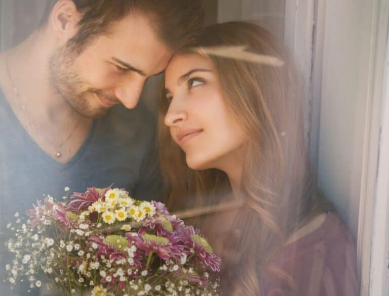 Young loving couple staring at each other