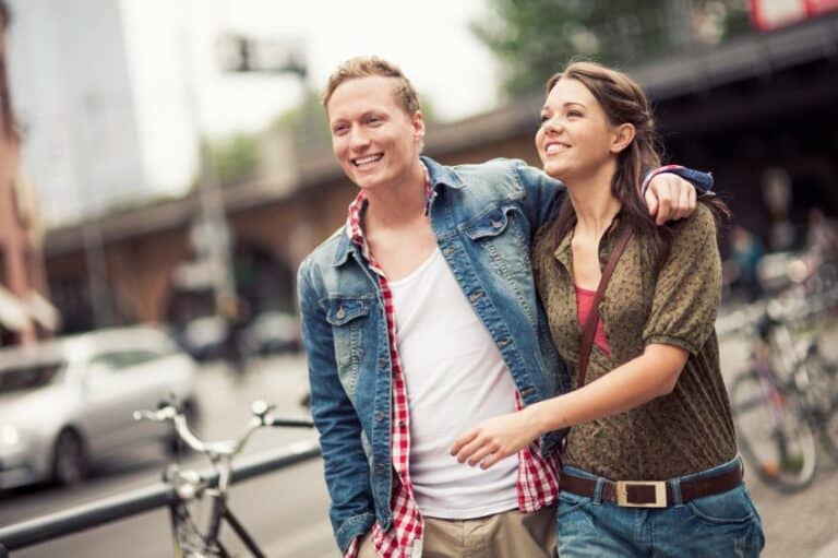 Young couple walking in city