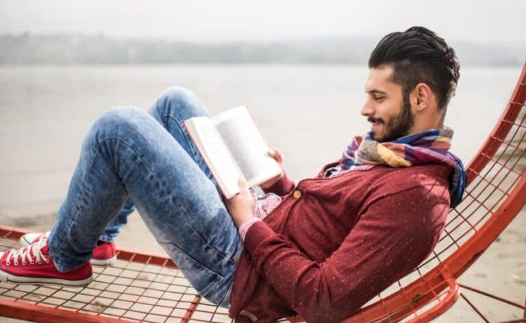 Smiling man relaxing outdoors