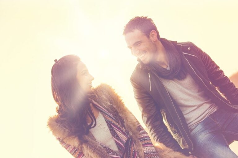 Couple sat in sunset