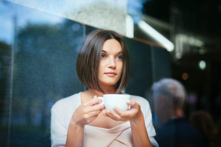 Beautiful woman with coffee cup