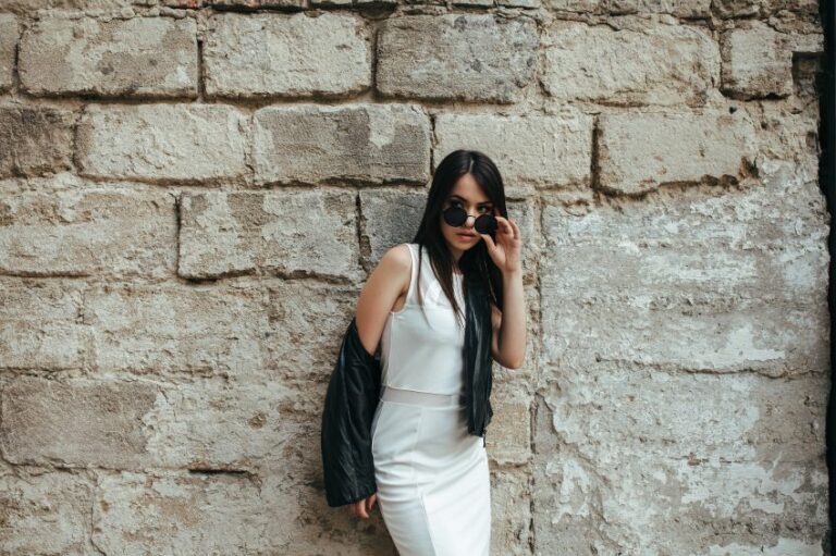 Attractive fashion woman in white dress
