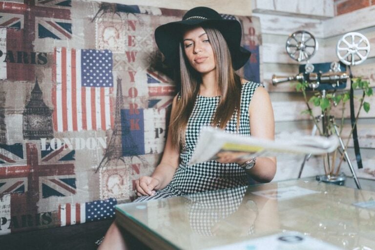 Woman with newspaper