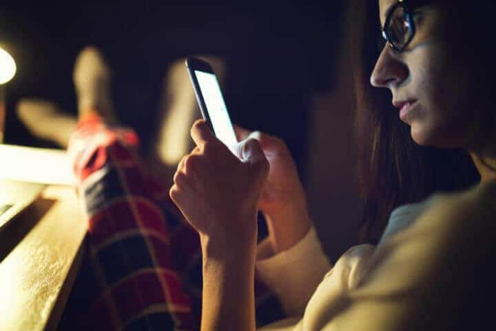 Girl looking at smartphone
