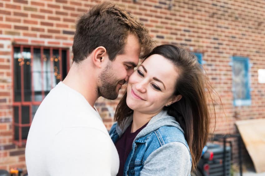 Couple outdoors smiling