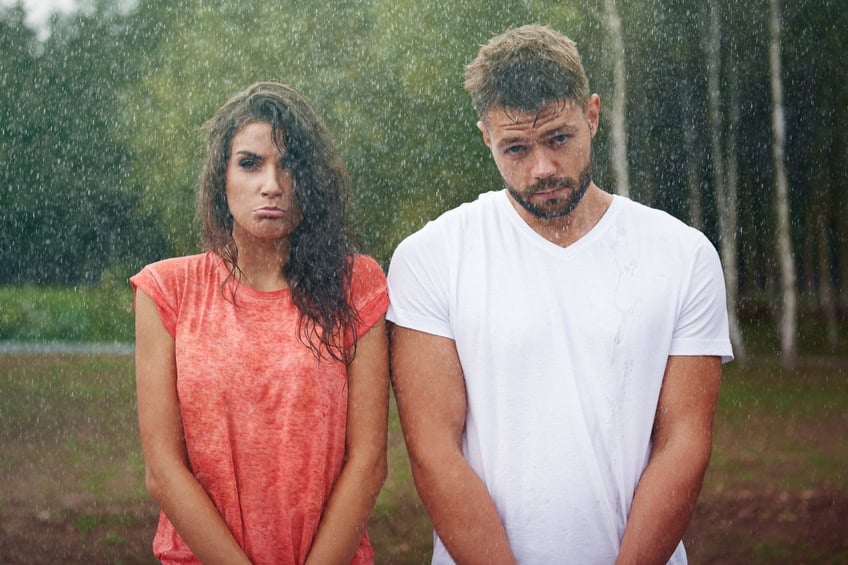 couple outside in the rain