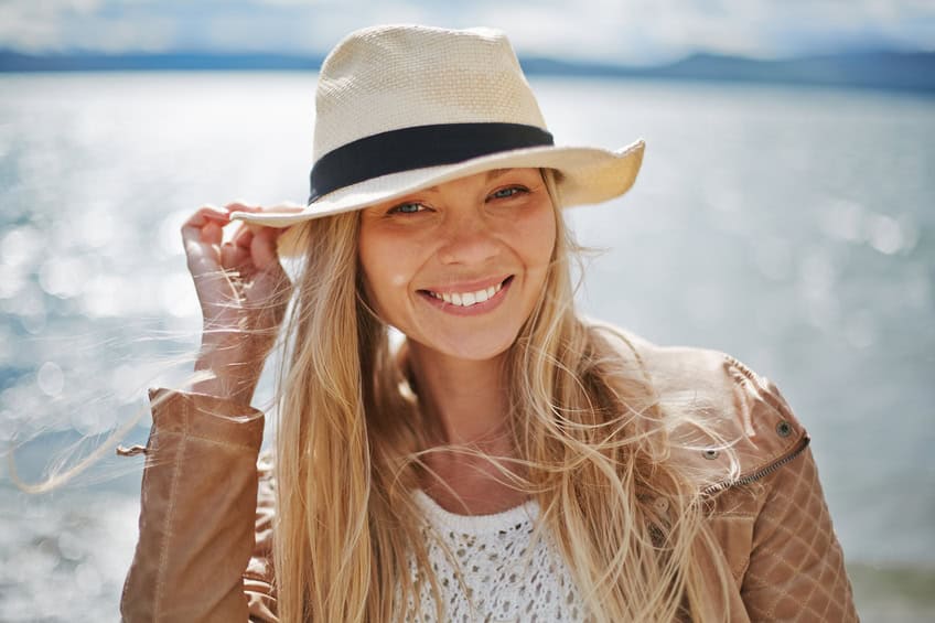 Blonde smiling woman hat