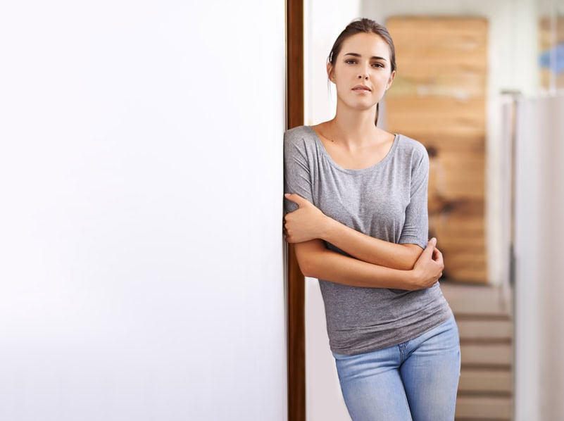 Young woman at the door