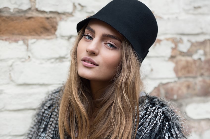 Young brunette wall hat