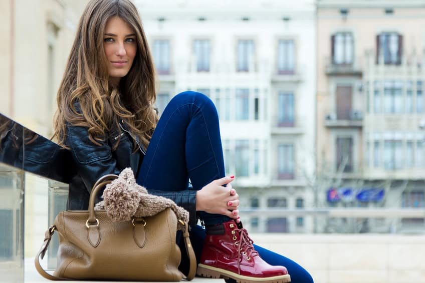 woman bench city