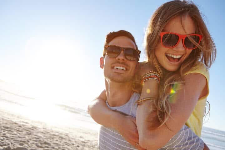 couple happy beach summer sun