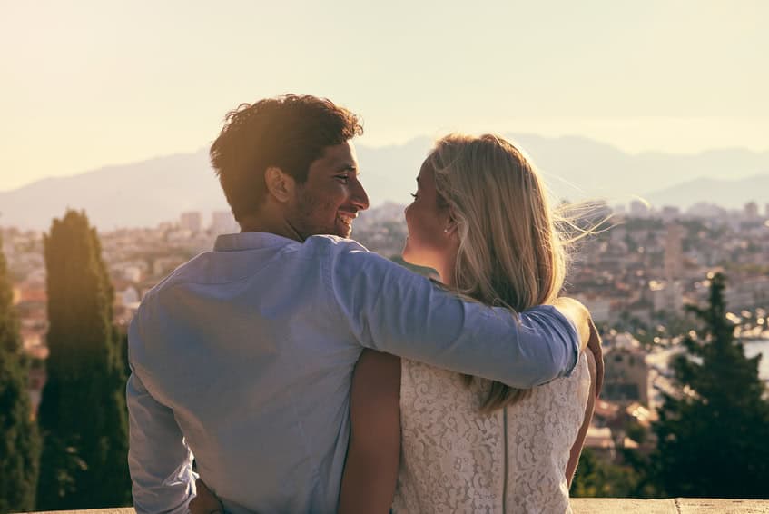 Couple sat in the sunset
