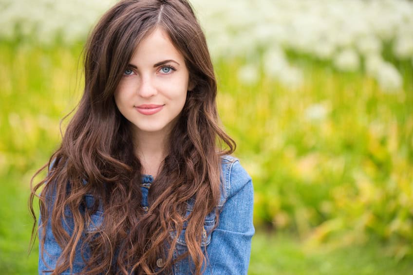 beautiful woman portrait outdoors grass green