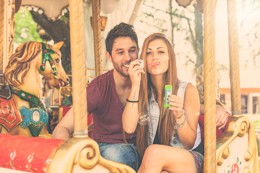 couple carnival carousel bubbles summer happy