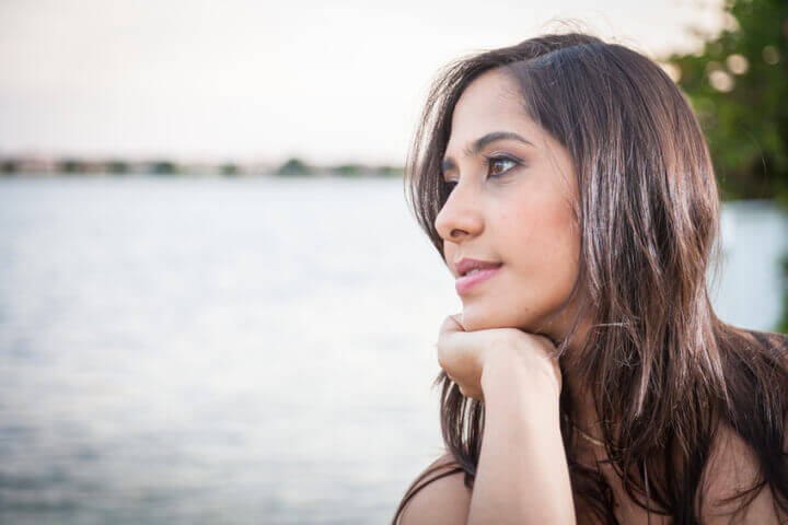 woman contemplative sea portrait water