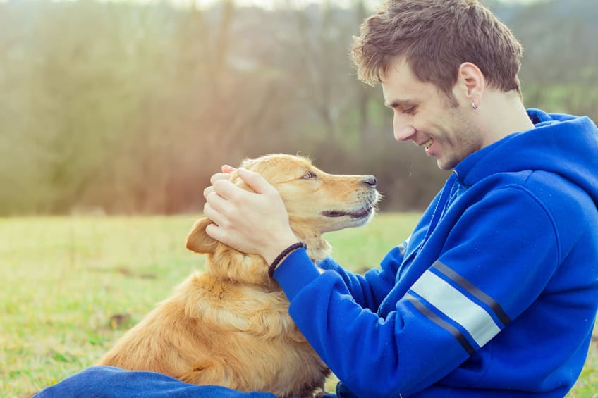 guy dog happy outdoors