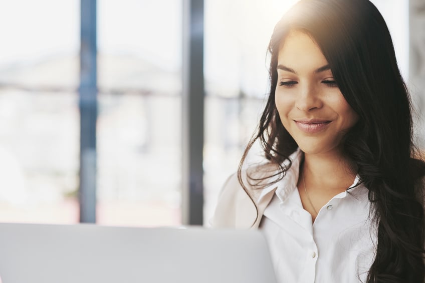 Young woman sat laptop