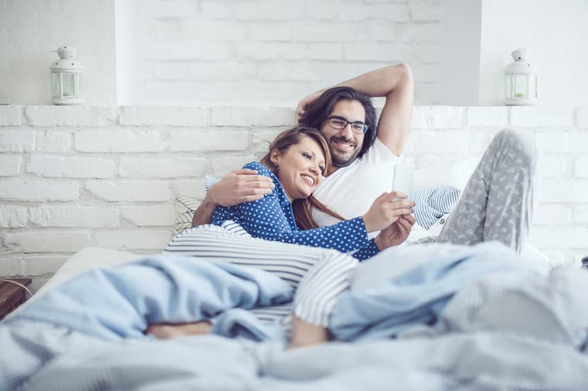 couple happy bed morning romance