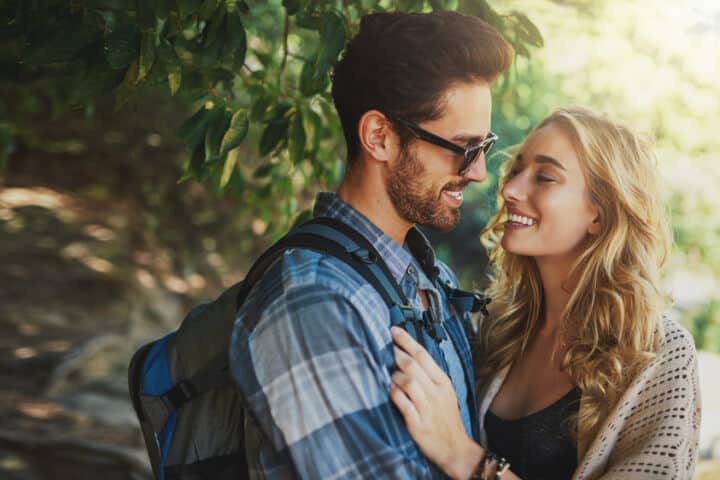 Shot of a happy young couple spending time together in nature