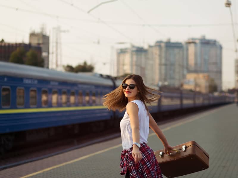 young woman train travel