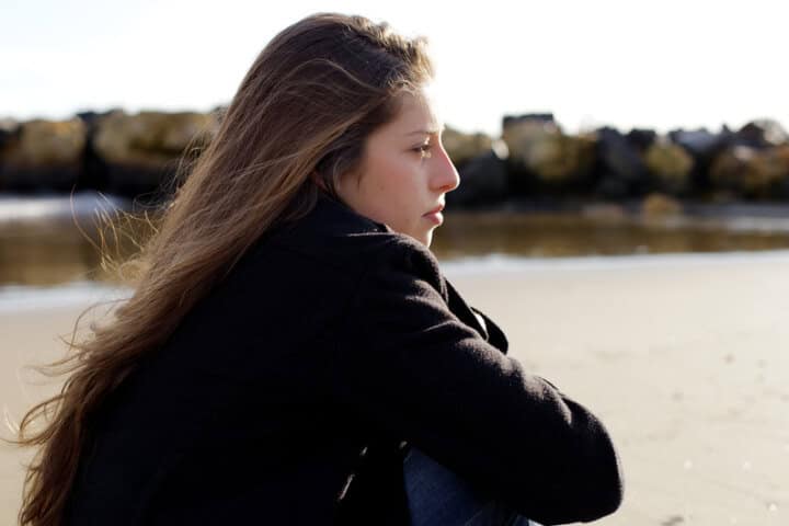 girl water sad portrait