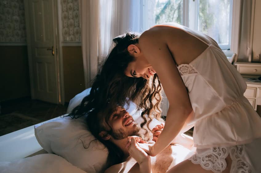 couple bed happy sex romance