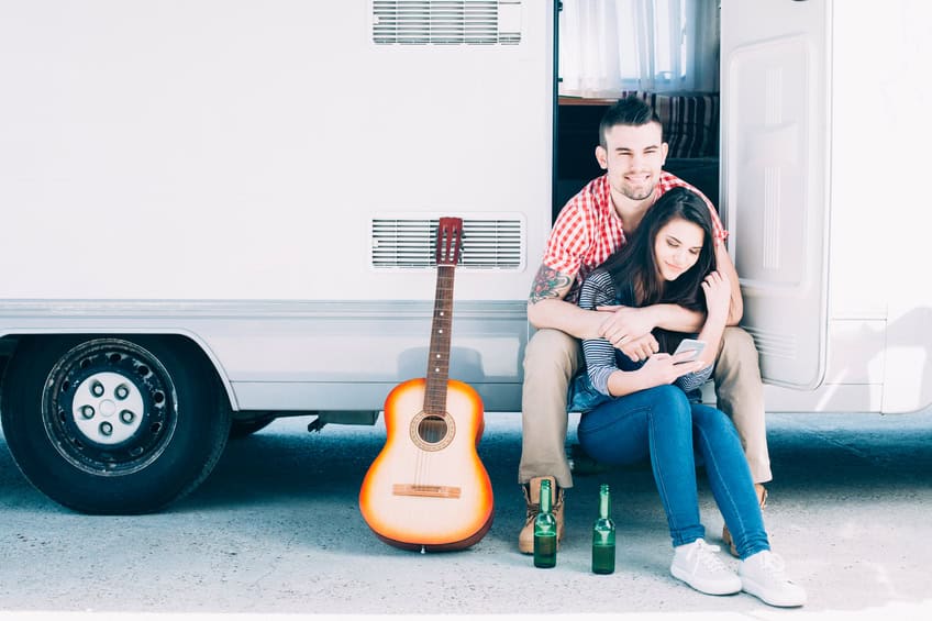 couple camping guitar romance