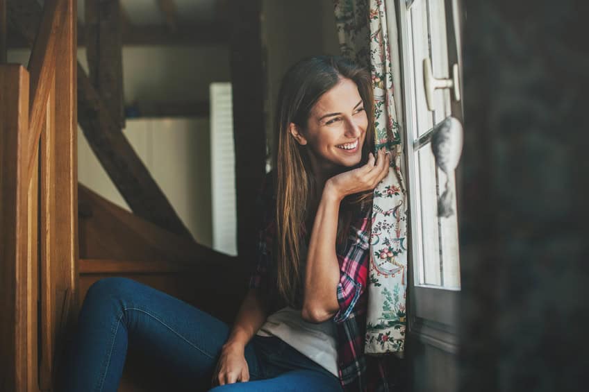 Brunette smiling window