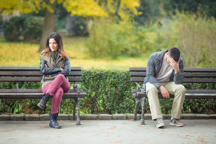 couple fighting argument park