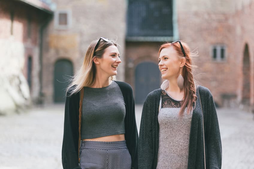 happy friends chatting travel outdoors