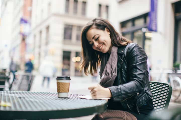 New York Woman Journaling in Park