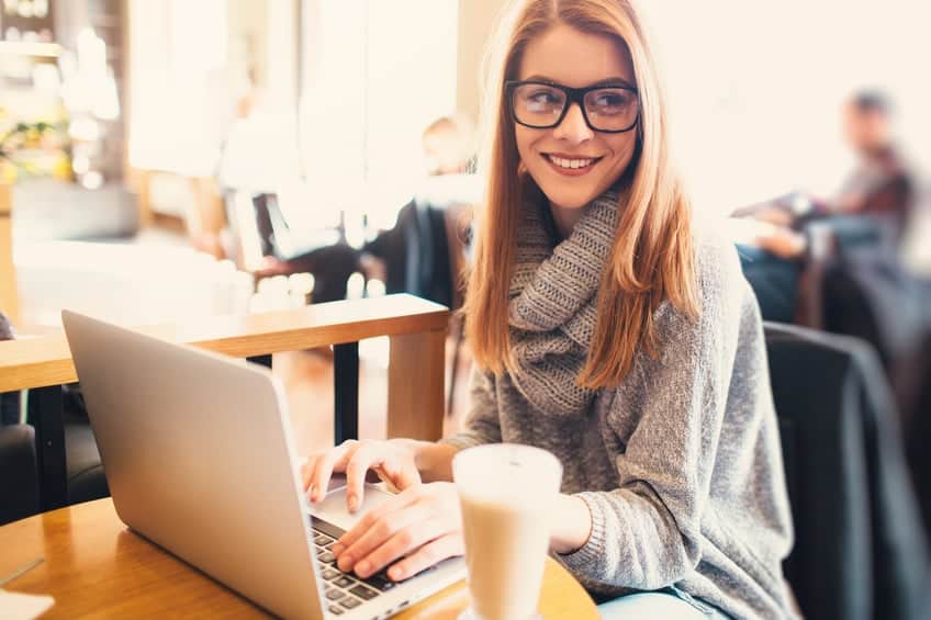 young woman cafe work laptop