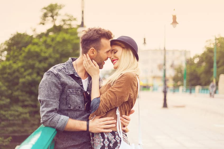 Outdoor portrait of couple in love in the city