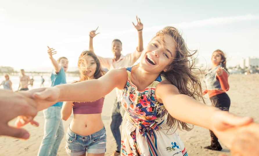young people happy friendly beach summer