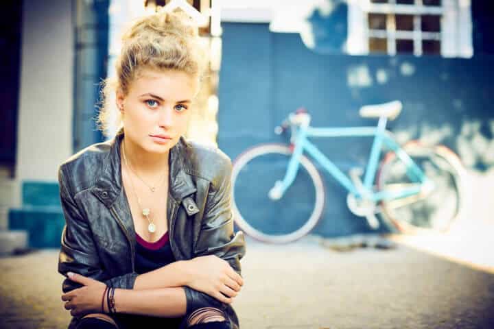 young woman arms crossed portrait