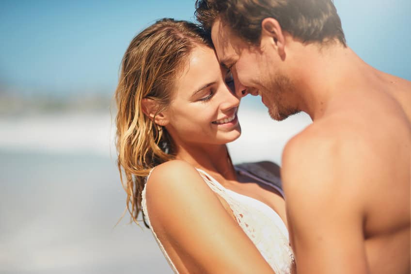 couple kissing beach summer romance