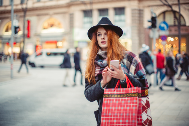 Young woman on the street of a big city.
