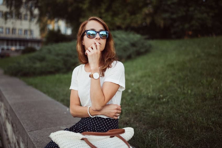 Young woman waiting for someone who is late