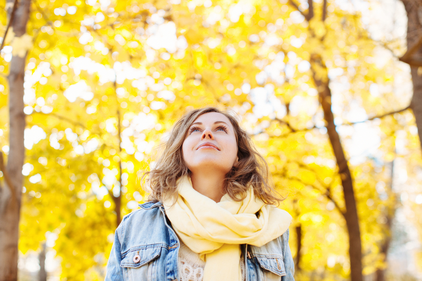 happy woman autumn park trees
